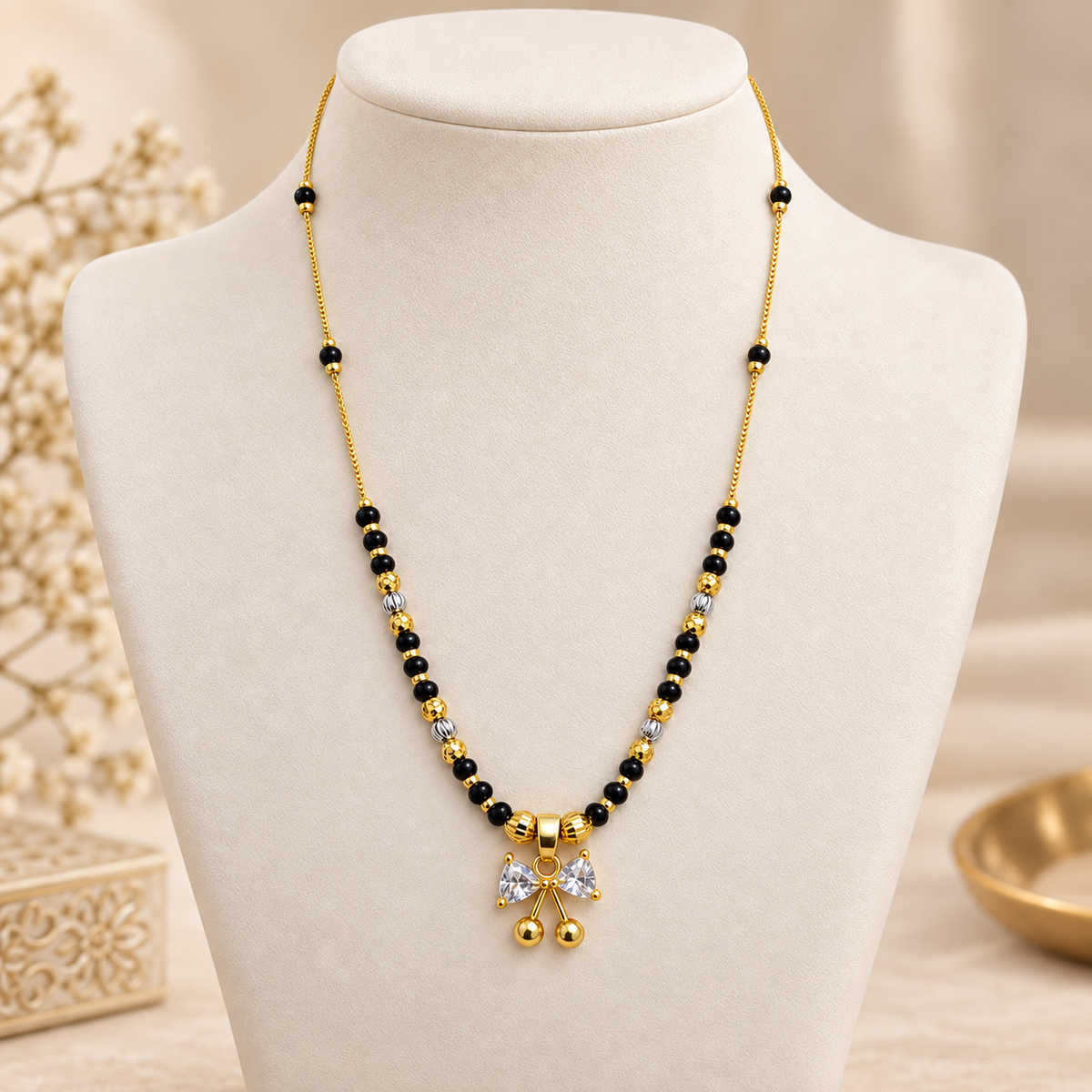 Bow & Cherry Crystal Gold Beaded Mangalsutra (MES100111)
