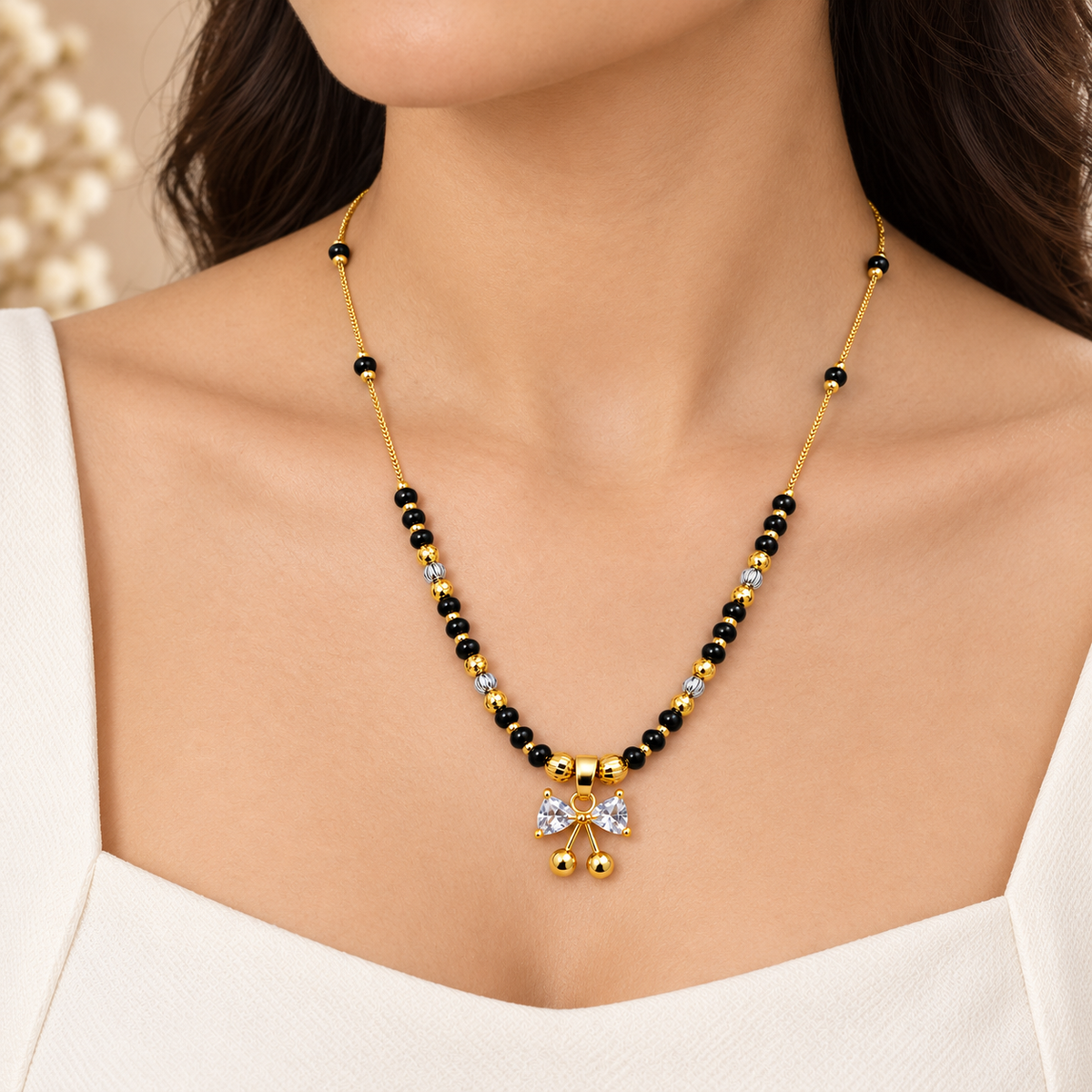Bow & Cherry Crystal Gold Beaded Mangalsutra (MES100111)