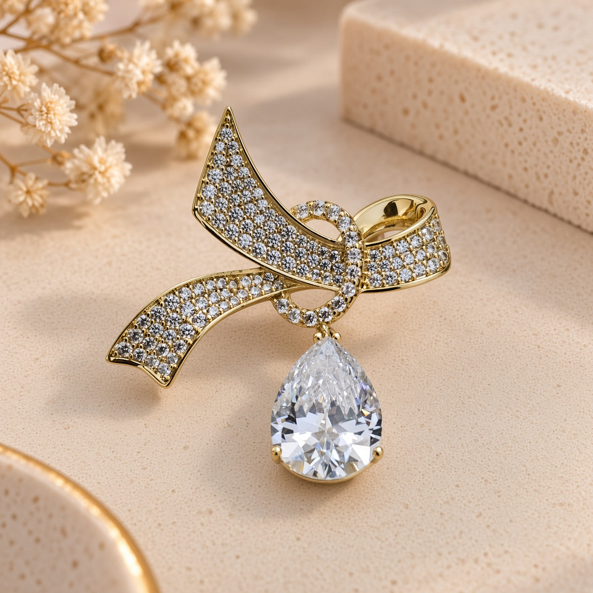 Teardrop Solitaire Pave Ribbon Knot Gold Brooch (MES100123)